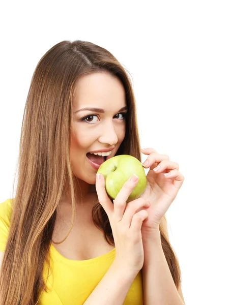 Gezonde jonge vrouw met groene appel geïsoleerd op wit — Stockfoto