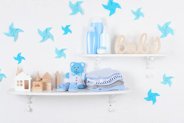 Baby accessories on shelves close-up — Stock Photo, Image