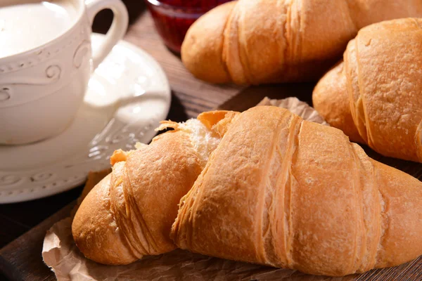 Delicious croissants on table close-up — Stock Photo, Image