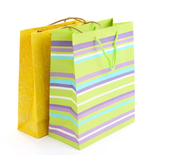 Sacos de papel de compras coloridos isolados em branco — Fotografia de Stock