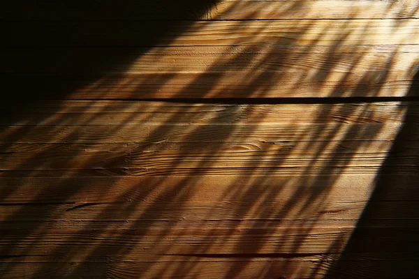 Faisceau lumineux sur fond en bois — Photo