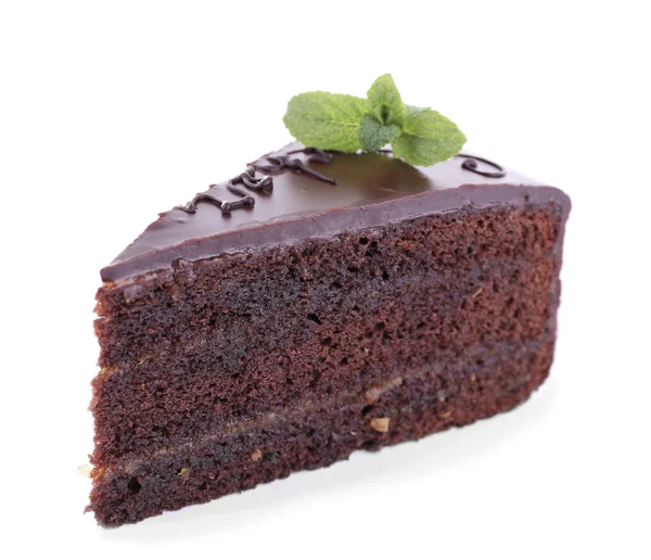 Pedazo de pastel de chocolate con menta aislada en blanco — Foto de Stock