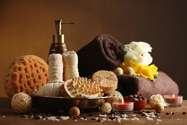 Composition of spa treatment on wooden table, on dark color background — Stock Photo, Image