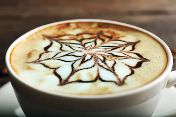 Cup of latte art coffee, closeup — Stock Photo, Image