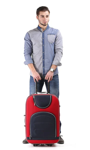 Man in het blauwe shirt en spijkerbroek met koffer geïsoleerd op wit — Stockfoto