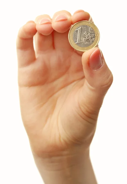 白で隔離コインと女性の手 — ストック写真
