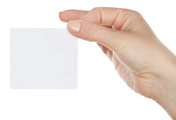 Χέρι κρατώντας λευκή κάρτα που απομονώνεται σε λευκό — Φωτογραφία Αρχείου