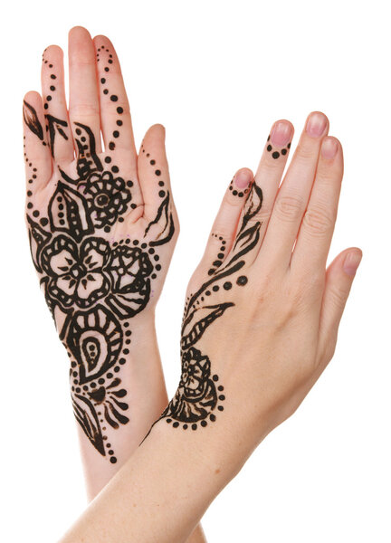 Image of henna on female hands isolated on white