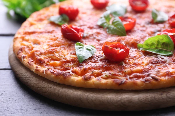 Pizza with basil and cherry tomatoes — Stock Photo, Image