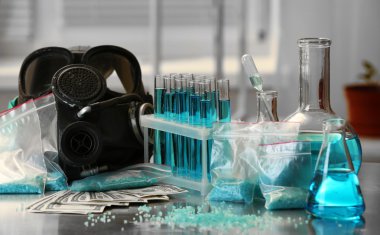 Drug laboratory: blue  methamphetamine and money clipart