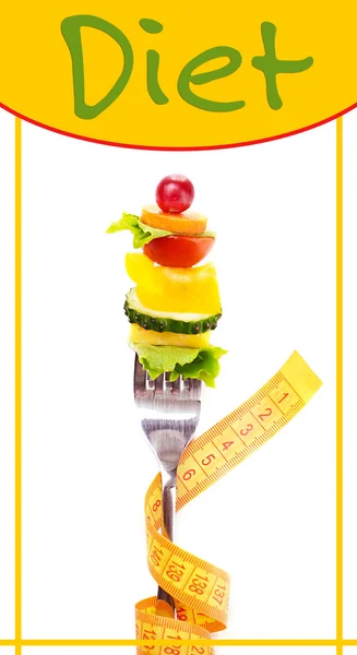 Snack van groenten op vork met meetlint — Stockfoto