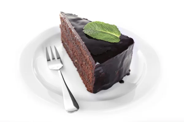 Pedazo de pastel de chocolate con menta — Foto de Stock