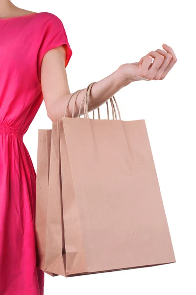 Woman holding paper shopping bag — Stock Photo, Image