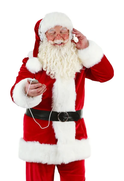 Papai Noel com fones de ouvido ouvindo música, isolado em fundo branco — Fotografia de Stock