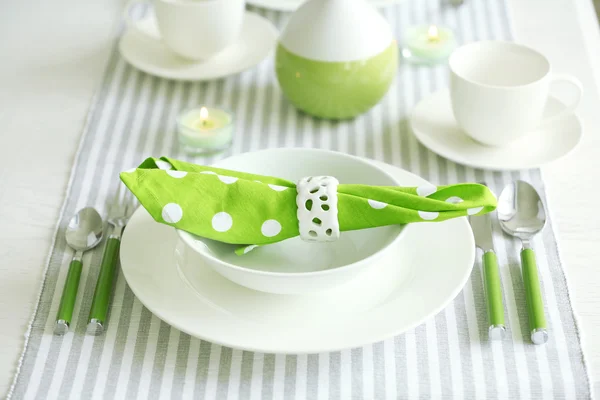 Table setting in white and green color — Stock Photo, Image