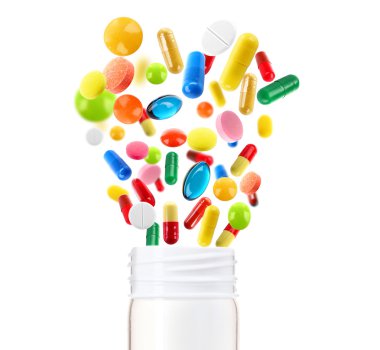 farklı hapları üzerinde beyaz izole açık plastik şişe uzak uçan