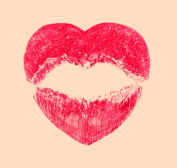 Kissing lips in shape of heart on beige background — Stock Photo, Image