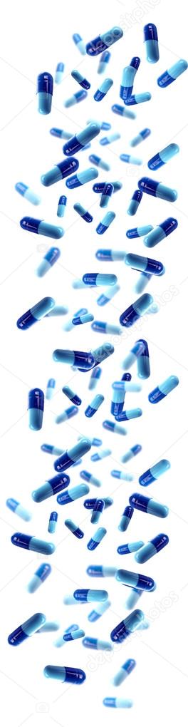 Falling blue medical pills isolated on white