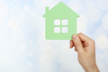 ev ışık tutan el arka plan bulanık