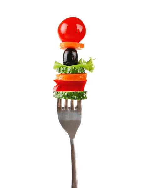 Diferentes verduras en tenedor aislado en blanco —  Fotos de Stock