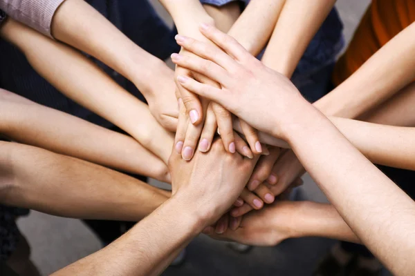 United hands outdoors — Stock Photo, Image