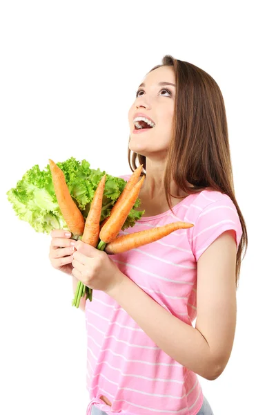 Здорова молода жінка з морквою і салатом ізольована на білому — стокове фото