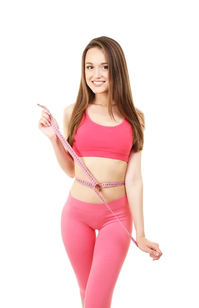 Young slim woman measuring her waist isolated on white — Stock Photo, Image