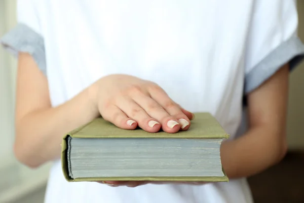 Woman holding book close up — Stock Photo, Image