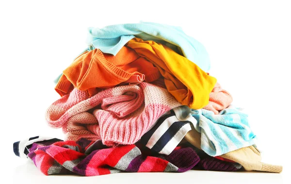 Heap of different clothes, isolated on white — Stock Photo, Image