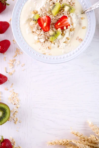 Healthy homemade oatmeal on wooden table, close up — Stock Photo, Image