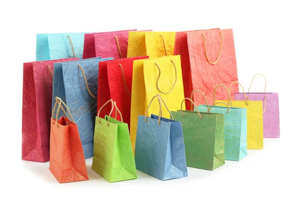 Beyaz izole renkli alışveriş kağıt torbalar — Stok fotoğraf