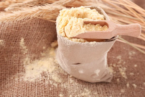 Flour in bag with wheat ears — Stock Photo, Image