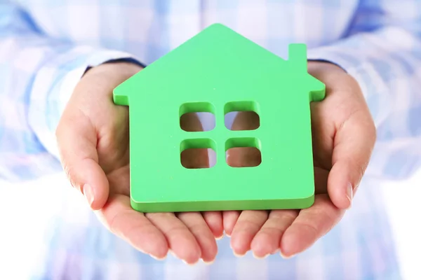 Female hands holding house, closeup — Stock Photo, Image