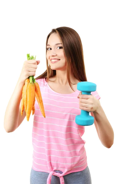 健康的年轻女子，与胡萝卜和哑铃上白色孤立 — 图库照片