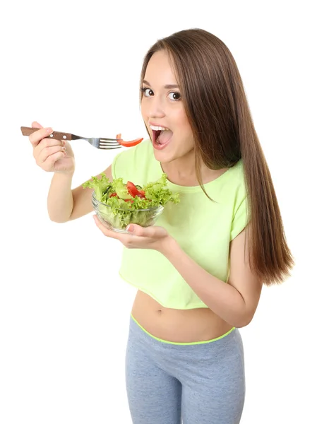 Giovane donna magra con ciotola di vetro di insalata dieta isolata su bianco — Foto Stock