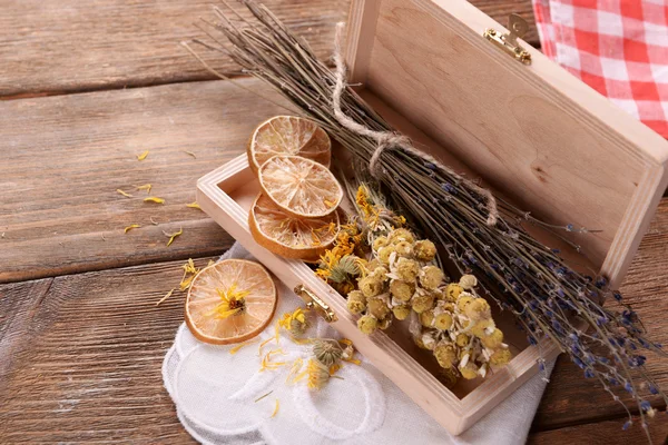 Dried herbs on table — Stock Photo, Image