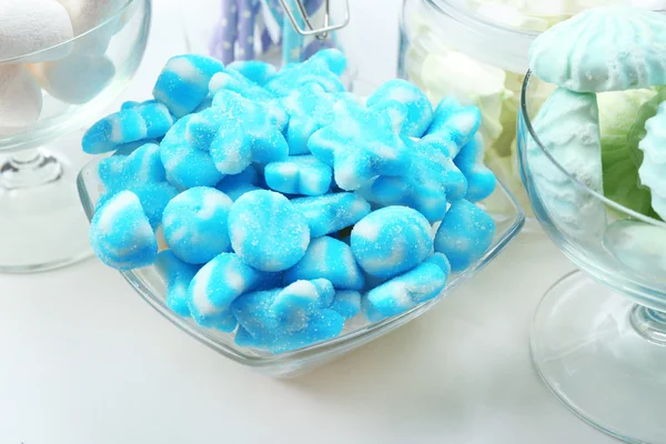 Sweet candies in glassware on table, closeup — Stock Photo, Image