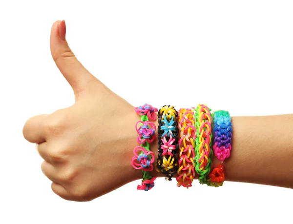 Mano femminile con bracciali — Foto Stock