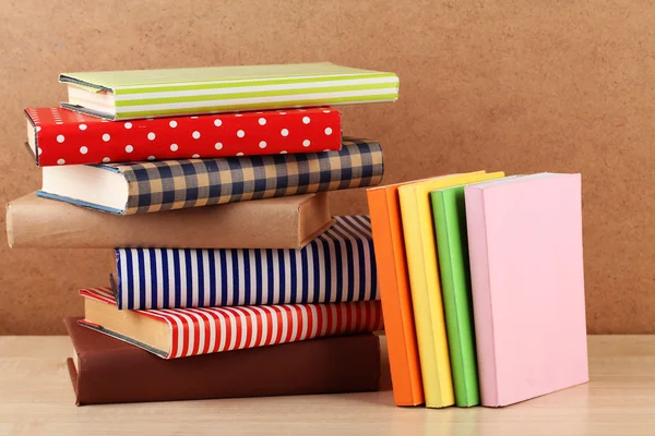 Books on shelf, close-up, on wooden background — Stock Photo, Image