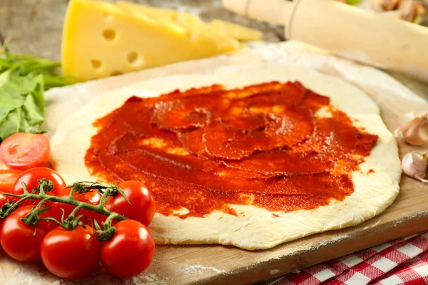 Food ingredients for pizza on table close up — Stock Photo, Image