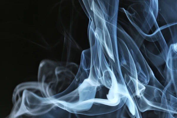 Color smoke from match on dark background — Stock Photo, Image