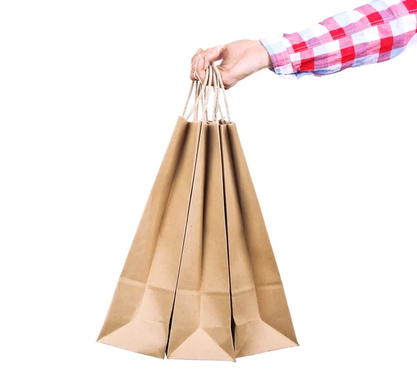 Γυναικείο χέρι που κρατά το χαρτί shopping bag απομονωθεί σε λευκό — Φωτογραφία Αρχείου