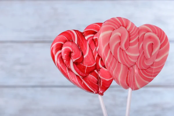 Bright lollipops in shape of heart — Stock Photo, Image