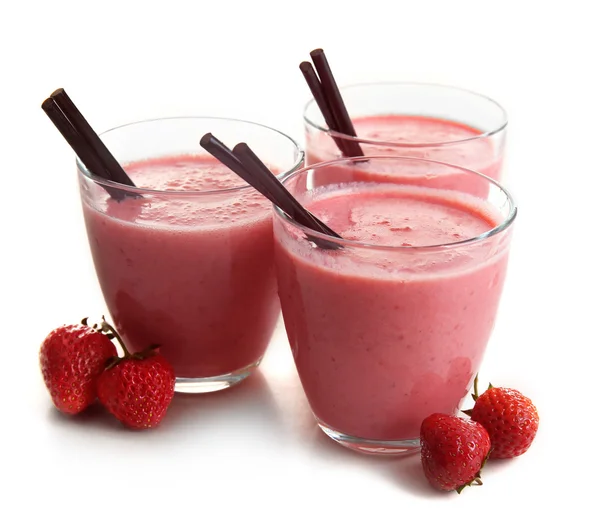 Glasses of milkshake with strawberries — Stock Photo, Image