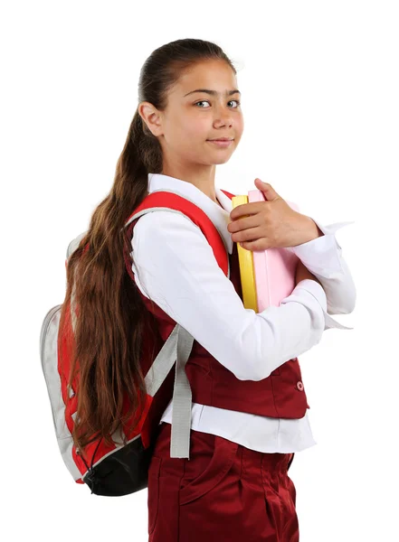 Schönes kleines Mädchen in Schuluniform isoliert auf weiß — Stockfoto