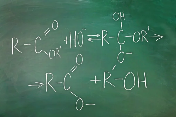 Molecule models and formulas on blackboard background — Stock Photo, Image