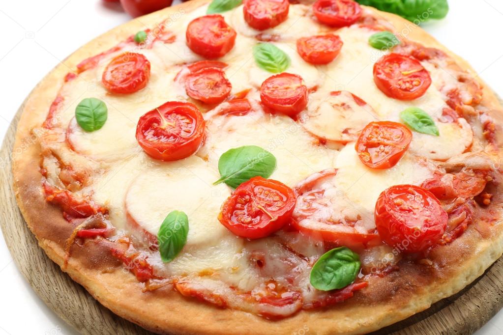 Delicious pizza with cheese and cherry tomatoes isolated on white