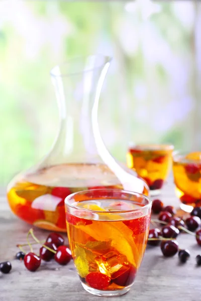 Punch with berries in glassware — Stock Photo, Image