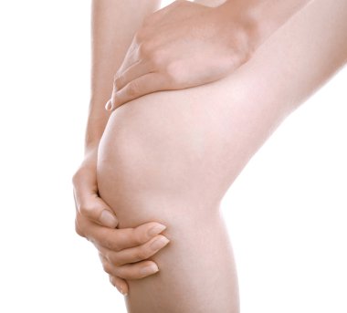 beyaz izole diz ağrısı olan kadın