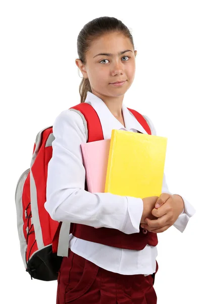 Linda menina em uniforme escolar isolado no branco — Fotografia de Stock